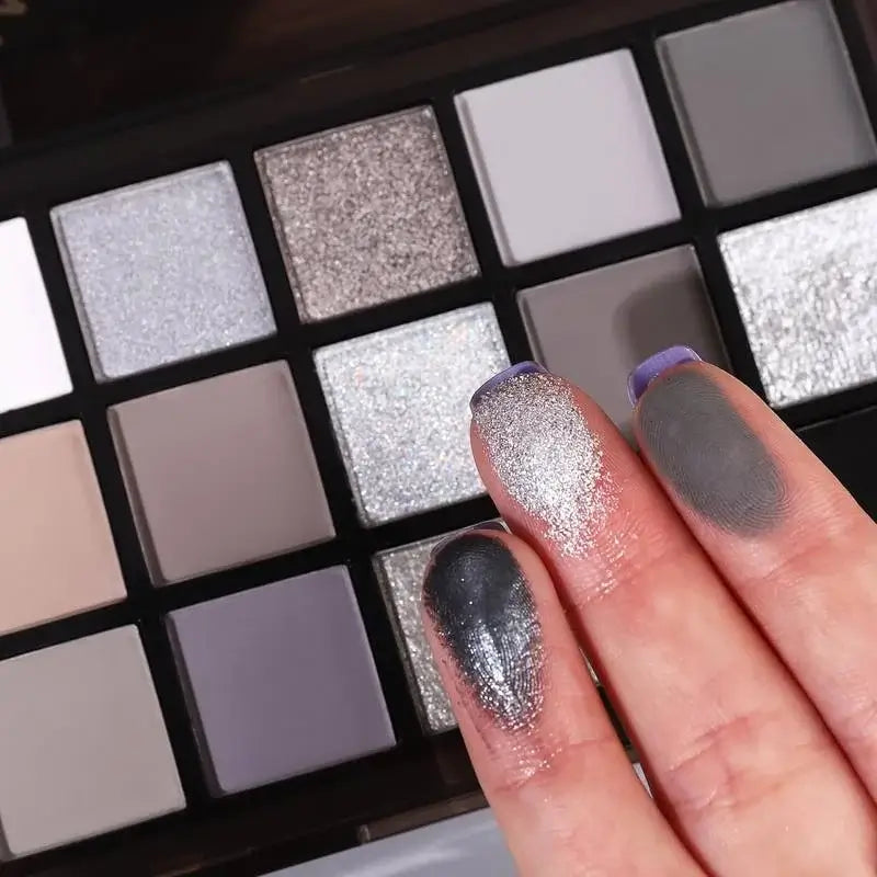Frost Glow Cosmetics smokey eyeshadow palette. 15 neutral, shimmer & pearly sequin shades for bold punk or soft glam looks.