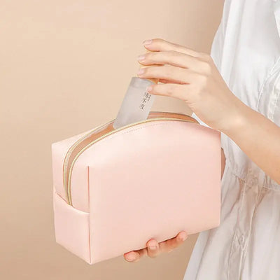 Stay organized in style with Frost Glow’s waterproof PU leather cosmetic bag—perfect for travel, makeup, and toiletry storage. Sleek, durable, and portable.