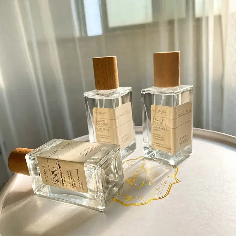 Premium unisex Eau De Parfum with woody & light floral notes. A fresh, long-lasting fragrance that feels elegant & luxurious.