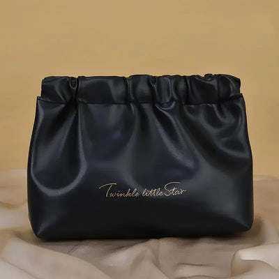 Stylish PU makeup bag with self-closing design. Perfect for travel, cosmetics, and daily essentials. Shop Frost Glow Cosmetics beauty storage today!