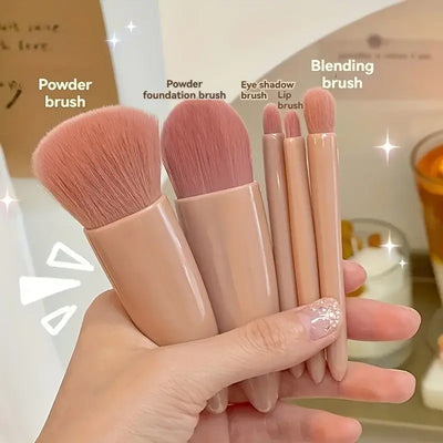 Compact 5pcs portable makeup brush set with foldable mirror. Perfect for travel touch-ups. Shop beauty tools at Frost Glow Cosmetics today!