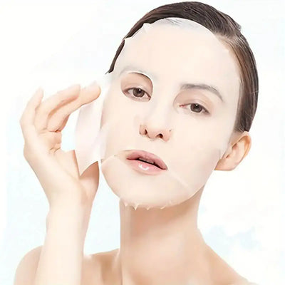 Frost Glow Cosmetics 100pcs facial mask paper sheets are unscented, hydrating & moisture-retentive DIY skincare wraps for soft skin.