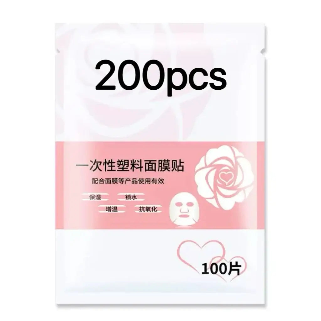 Frost Glow Cosmetics 100pcs facial mask paper sheets are unscented, hydrating & moisture-retentive DIY skincare wraps for soft skin.