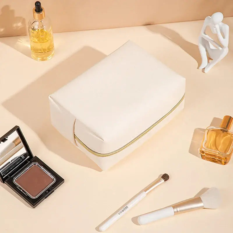 Stay organized in style with Frost Glow’s waterproof PU leather cosmetic bag—perfect for travel, makeup, and toiletry storage. Sleek, durable, and portable.