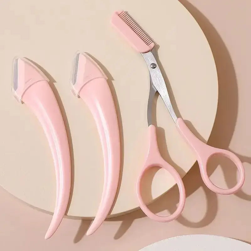 Frost Glow Cosmetics eyebrow trimmer set with curved razor, scissors & comb. Easy beauty tools for shaping brows at home.