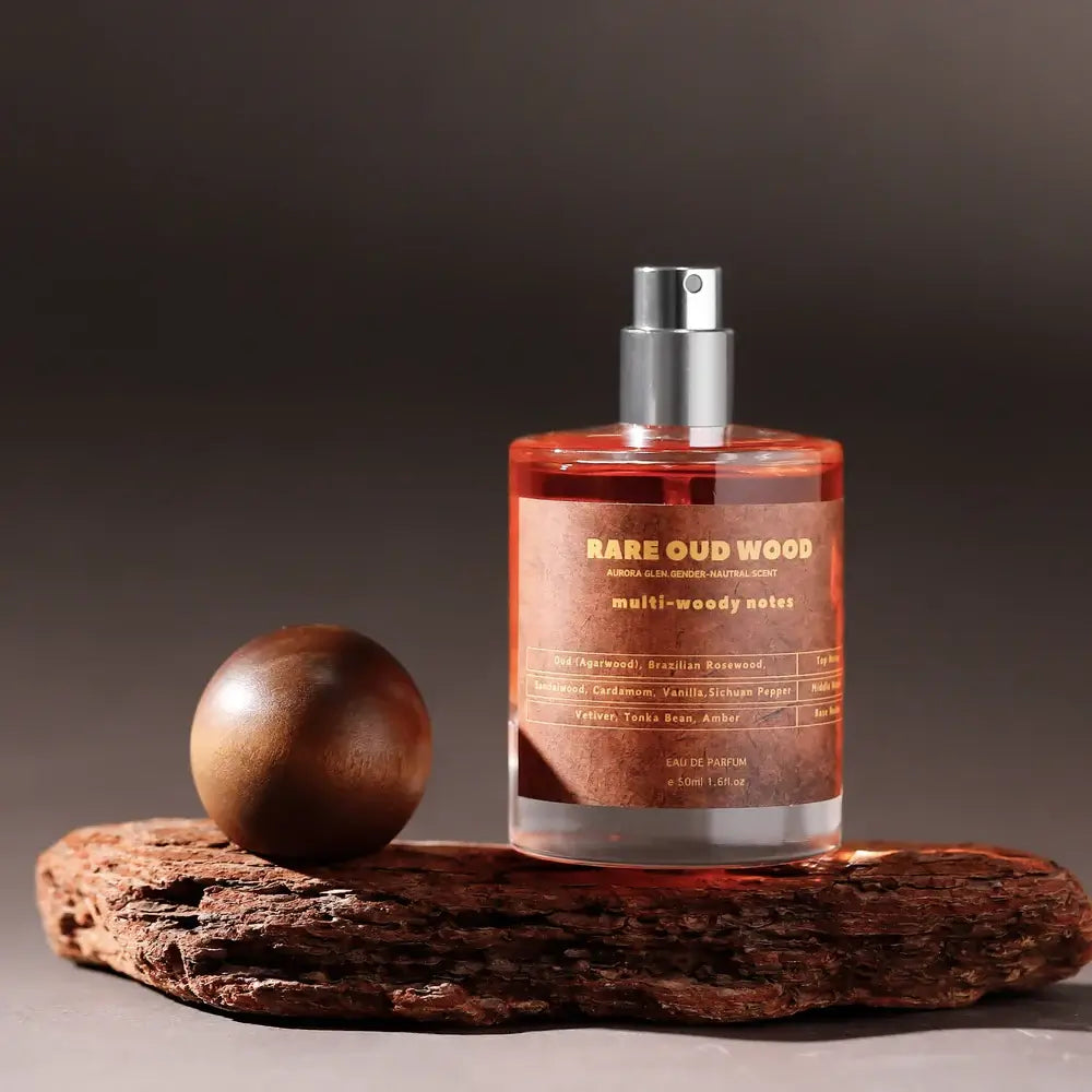 Luxury unisex 50ml perfume with oud, sandalwood & tonka. A woody Eau De Parfum for men & women with rich, lasting depth.