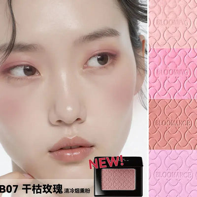 Model showcasing Blooming Blush Powder in B07, featuring soft pink tones and long-lasting cheek tint effect.