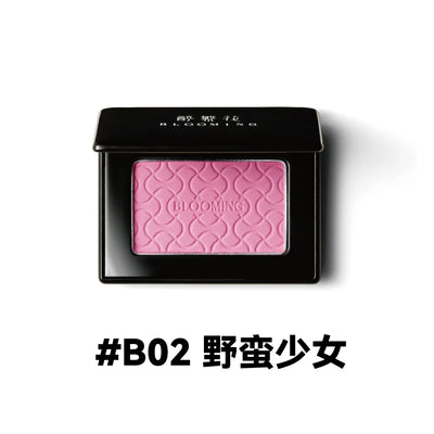 Model showcasing Blooming Blush Powder in B07, featuring soft pink tones and long-lasting cheek tint effect.