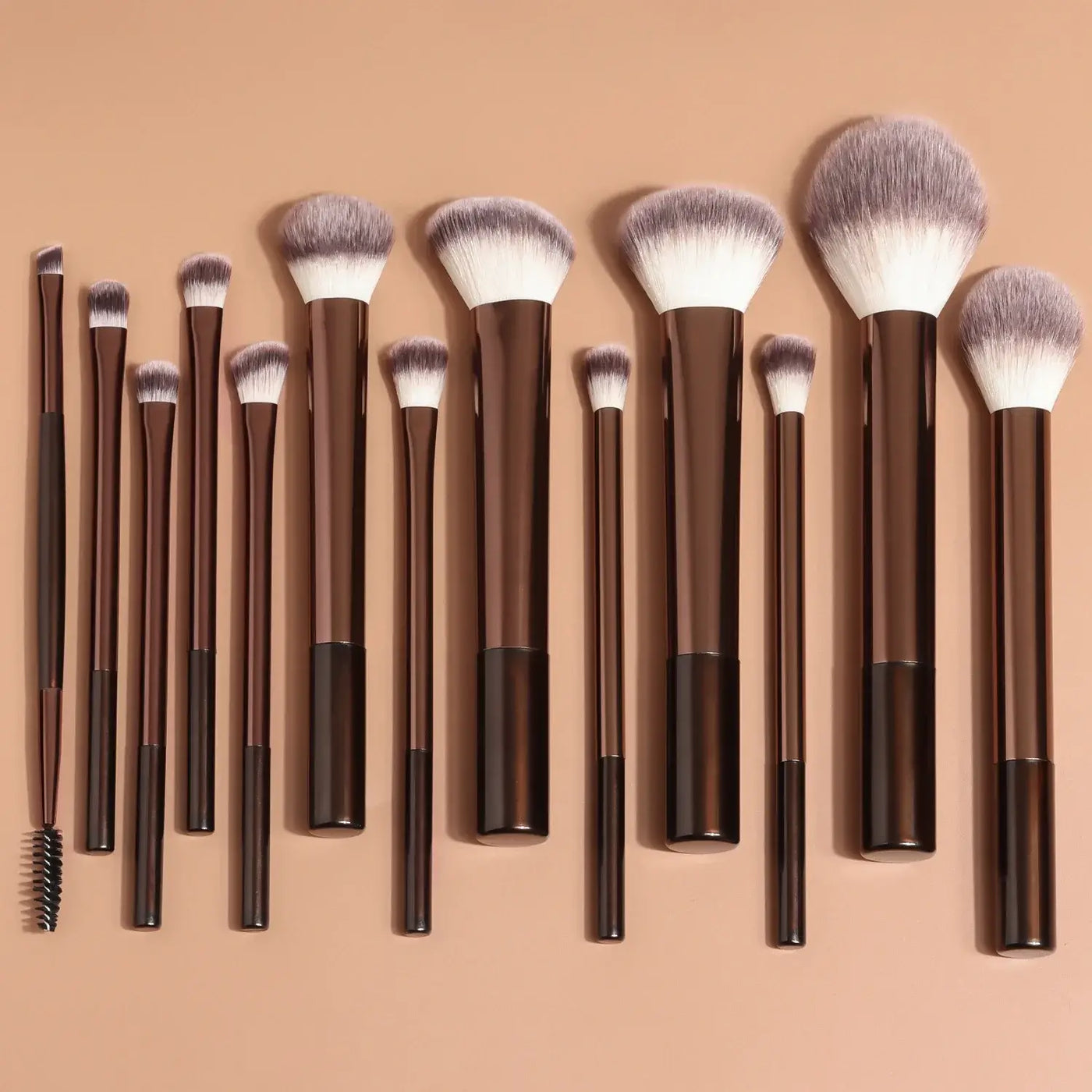 Professional 13pcs makeup brush set with kabuki, foundation, blush & eyeshadow brushes. Achieve flawless blending with Frost Glow Cosmetics.