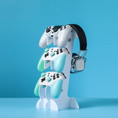 Frost Glow Cosmetics universal 3-layer stand for PS5, PS4, Xbox, and Switch controllers with headphone holder. Durable & space-saving.