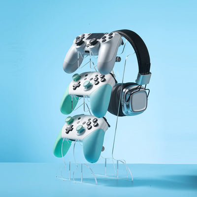 Frost Glow Cosmetics universal 3-layer stand for PS5, PS4, Xbox, and Switch controllers with headphone holder. Durable & space-saving.
