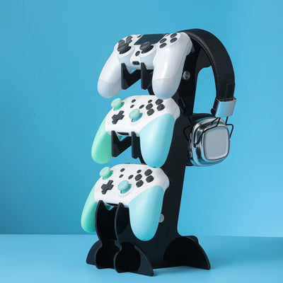 Frost Glow Cosmetics universal 3-layer stand for PS5, PS4, Xbox, and Switch controllers with headphone holder. Durable & space-saving.