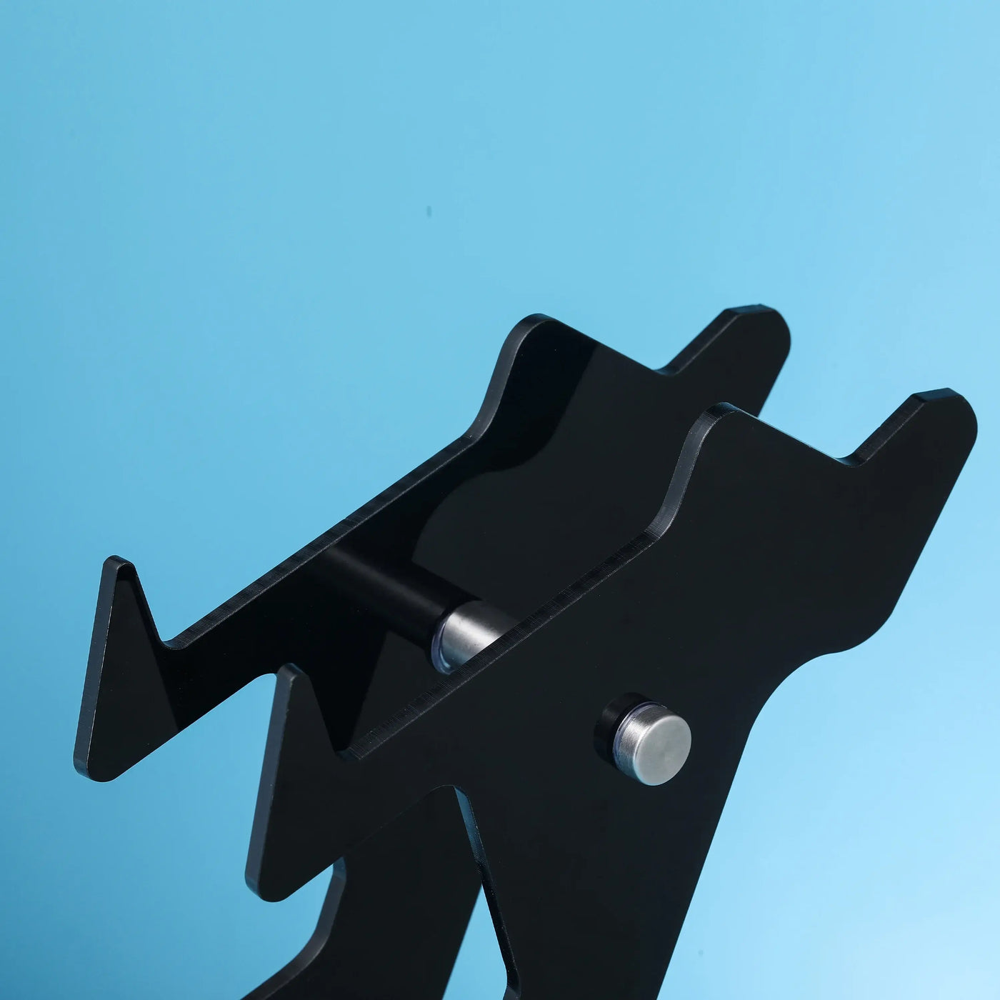 Frost Glow Cosmetics universal 3-layer stand for PS5, PS4, Xbox, and Switch controllers with headphone holder. Durable & space-saving.