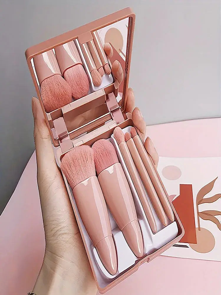Compact 5pcs portable makeup brush set with foldable mirror. Perfect for travel touch-ups. Shop beauty tools at Frost Glow Cosmetics today!