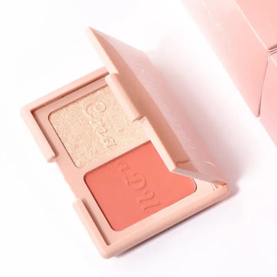 Frost Glow Cosmetics embossed highlighter on radiant skin, showcasing a shimmering finish and glowing complexion.