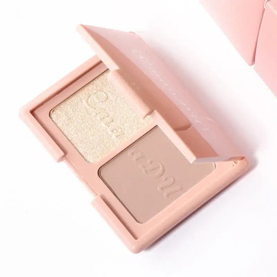 Frost Glow Cosmetics embossed highlighter on radiant skin, showcasing a shimmering finish and glowing complexion.