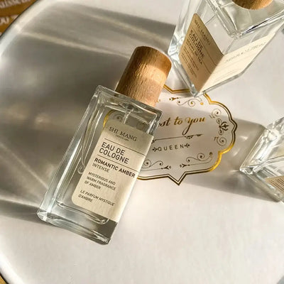 Premium unisex Eau De Parfum with woody & light floral notes. A fresh, long-lasting fragrance that feels elegant & luxurious.