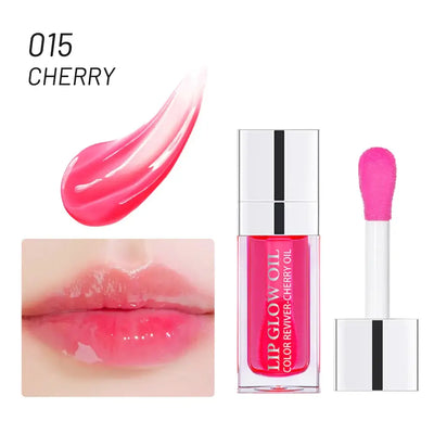 Frost Glow Cosmetics lip oil balms in pink, coral, and berry shades on a pink background.
