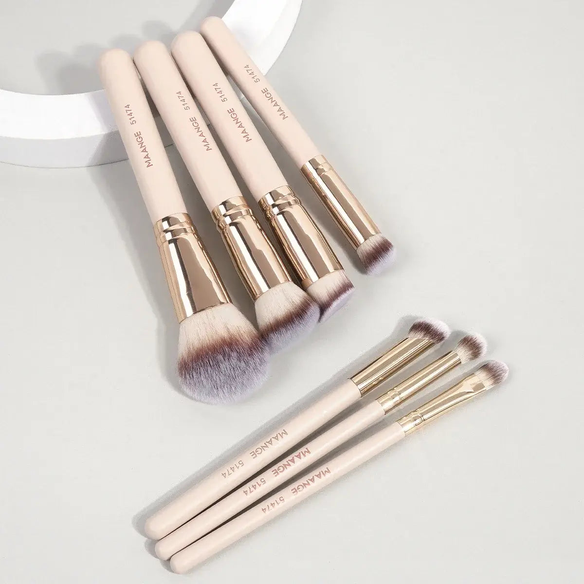 Soft bristle MAANGE 7pcs makeup brush set for flawless blending of foundation, blush & concealer. Shop premium beauty tools at Frost Glow Cosmetics.