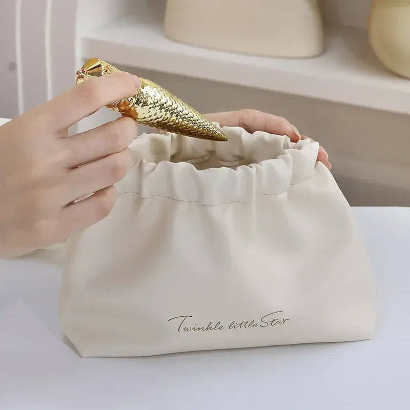 Stylish PU makeup bag with self-closing design. Perfect for travel, cosmetics, and daily essentials. Shop Frost Glow Cosmetics beauty storage today!