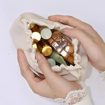 Stylish PU makeup bag with self-closing design. Perfect for travel, cosmetics, and daily essentials. Shop Frost Glow Cosmetics beauty storage today!