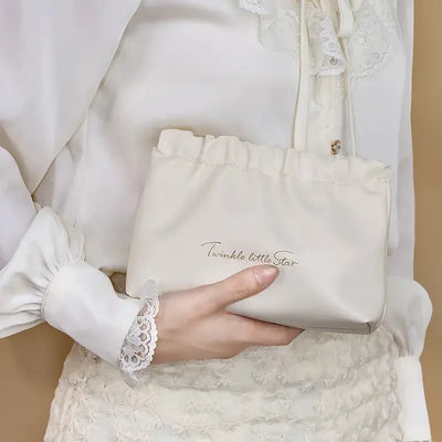 Stylish PU makeup bag with self-closing design. Perfect for travel, cosmetics, and daily essentials. Shop Frost Glow Cosmetics beauty storage today!