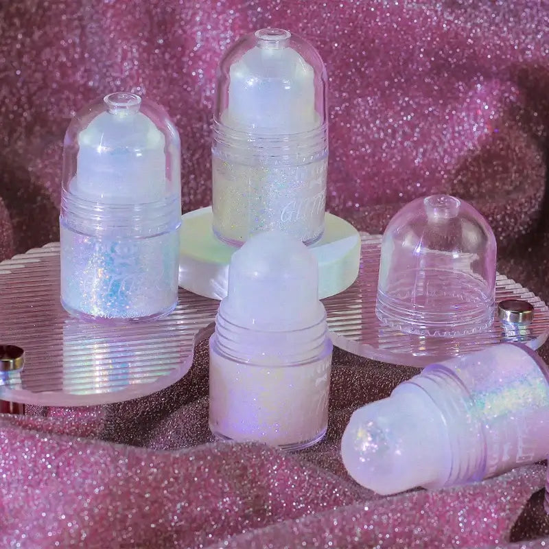 Frost Glow Cosmetics Rolling Ball Gel in various colors, showcasing shimmering effects on face and body for a glowing look.