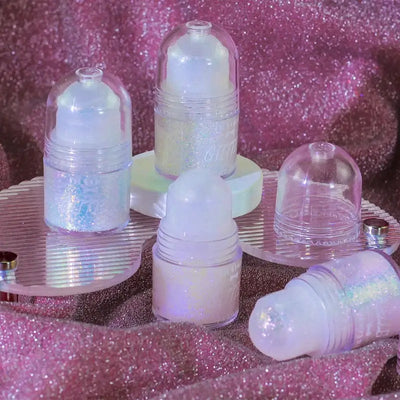 Frost Glow Cosmetics Rolling Ball Gel in various colors, showcasing shimmering effects on face and body for a glowing look.