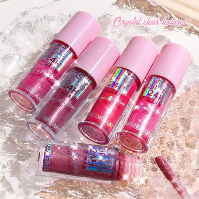 Frost Glow Cosmetics lip gloss with glitter glaze on sparkling pink lips, showcasing long-lasting shimmer in a stylish design.