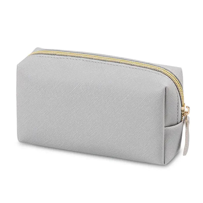 Stay organized in style with Frost Glow’s waterproof PU leather cosmetic bag—perfect for travel, makeup, and toiletry storage. Sleek, durable, and portable.