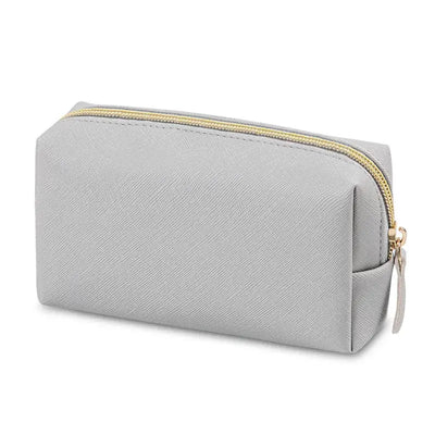 Stay organized in style with Frost Glow’s waterproof PU leather cosmetic bag—perfect for travel, makeup, and toiletry storage. Sleek, durable, and portable.