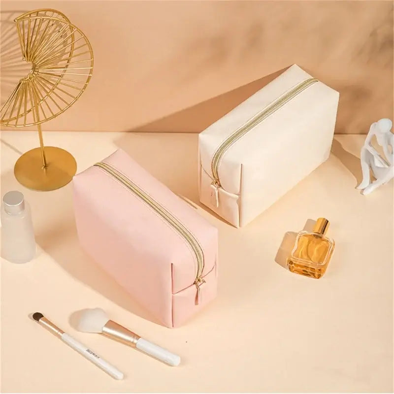 Stay organized in style with Frost Glow’s waterproof PU leather cosmetic bag—perfect for travel, makeup, and toiletry storage. Sleek, durable, and portable.