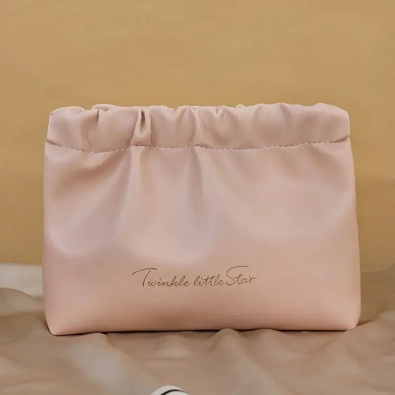 Stylish PU makeup bag with self-closing design. Perfect for travel, cosmetics, and daily essentials. Shop Frost Glow Cosmetics beauty storage today!