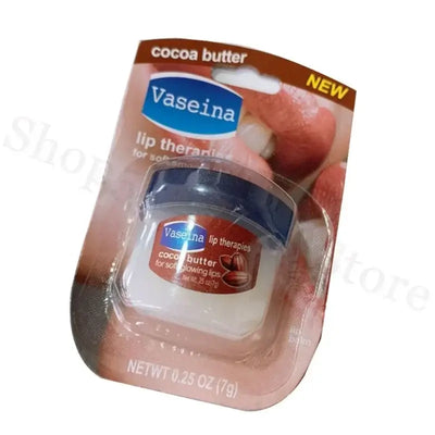 Four Vaseline lip balm jars in packaging, featuring rosy lips, caramel pudding, cocoa butter, and original flavors.
