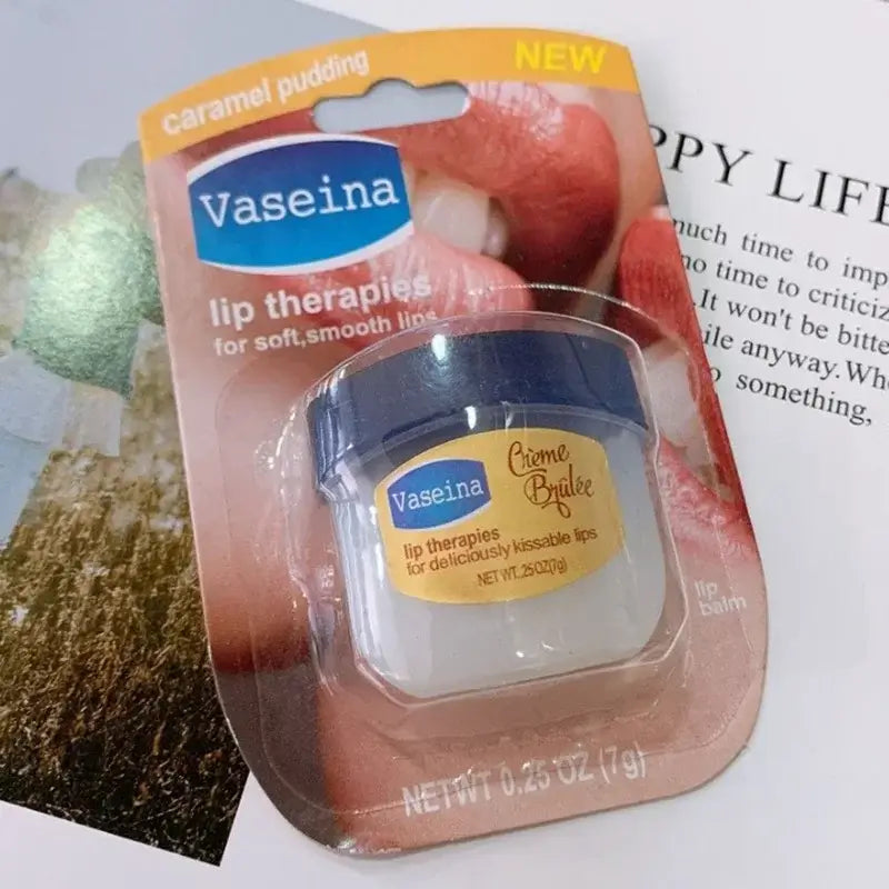 Four Vaseline lip balm jars in packaging, featuring rosy lips, caramel pudding, cocoa butter, and original flavors.